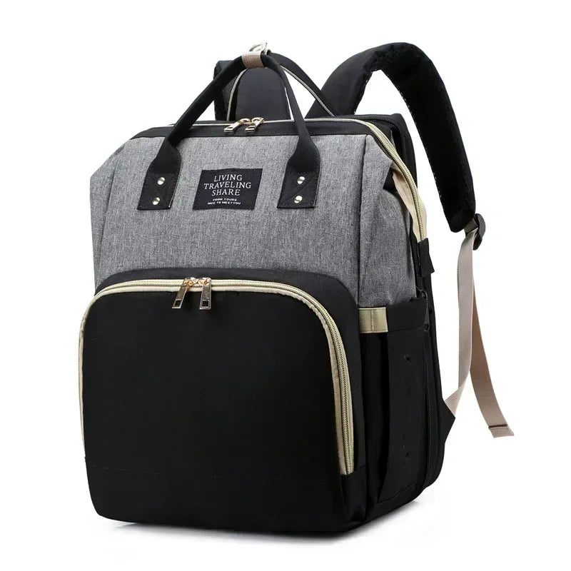 Mommy Bag – Wickelrucksack mit faltbarem Reisebett & großem Stauraum